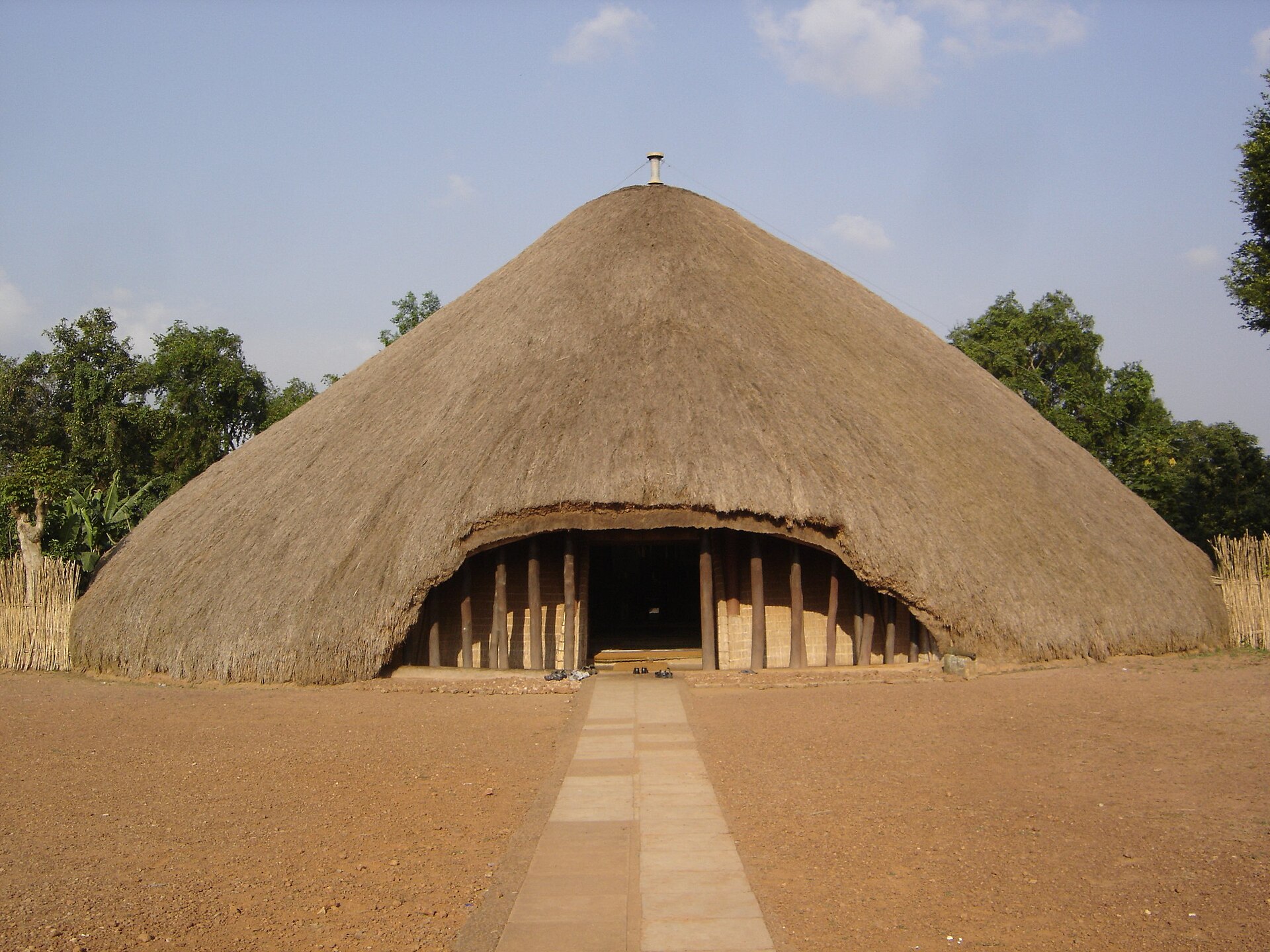 The great thatched mausoleum at the Kasubi Tombs, a circular grass-thatched building on Kasubi Hill.