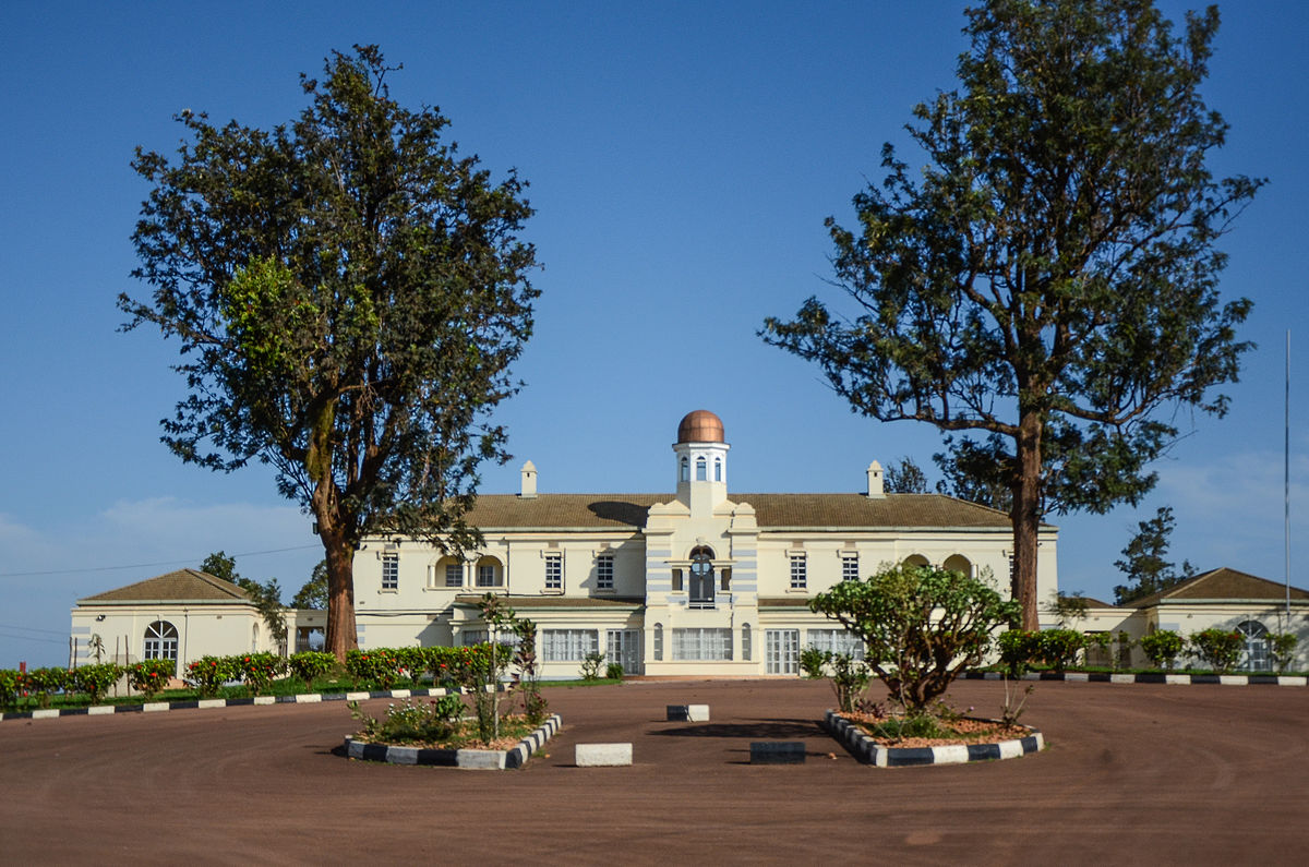 The Twekobe, the Kabaka's residence, seen across the tree-lined approach inside the Lubiri at Mengo.